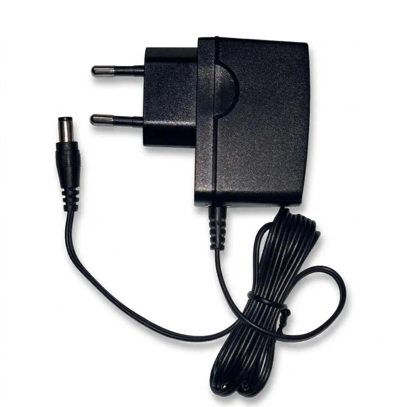 dkp-2528437-e50d341e6fd3e558264c94467b34efba0d883db961606df4ba881b55d8cd052e-7752fbb6-15c5-423b-8f25-406545c959ef آداپتور 9 ولت 0.6 آمپر تی پی لینک مدل T090060-2C1